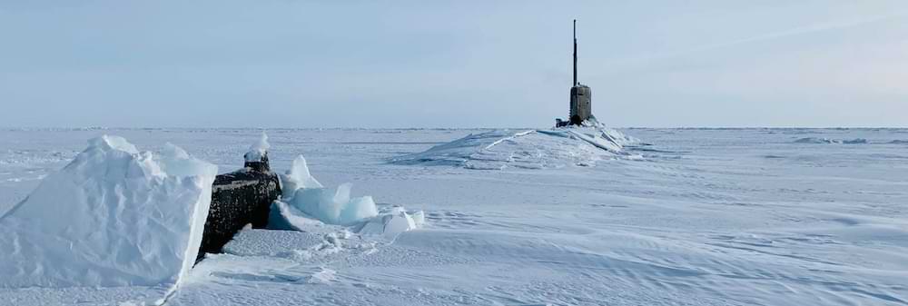 BEAUFORT SEA, Arctic Circle (Mar. 07, 2020) -- The Seawolf-class fast-attack submarine USS Connecticut (SSN 22) surfaces in the Arctic Circle during Ice Exercise (ICEX) 2020. ICEX 2020 is a biennial submarine exercise which promotes interoperability between allies and partners to maintain operational readiness and regional stability, while improving capabilities to operate in the Arctic environment. U.S. Navy photo by Mike Demello